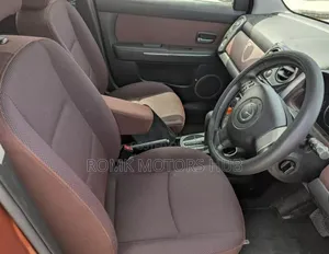 Mazda Verisa 2009 Red