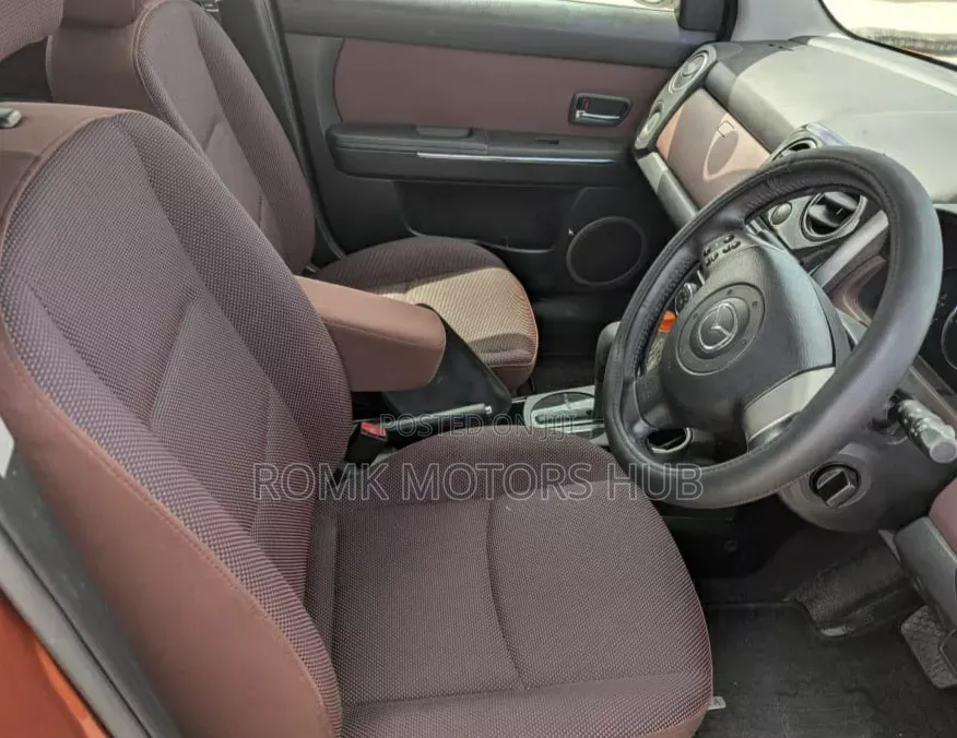 Mazda Verisa 2009 Red