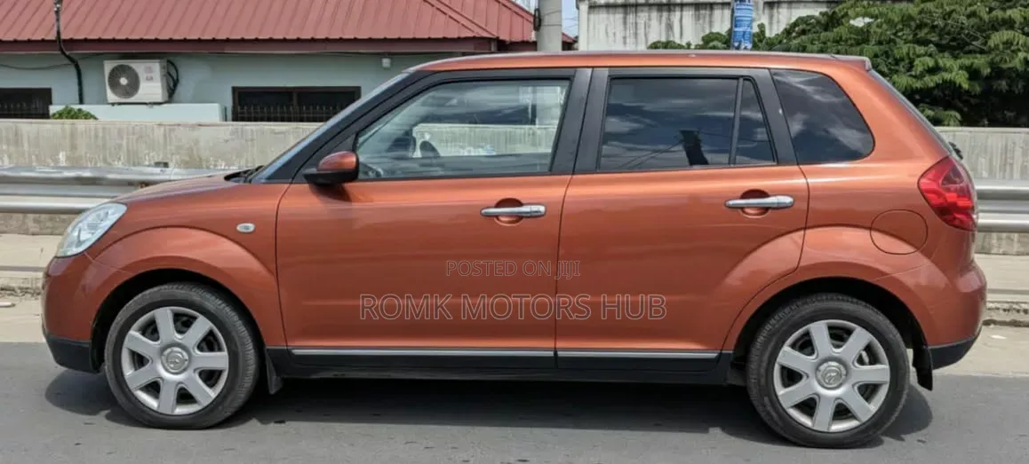 Mazda Verisa 2009 Red