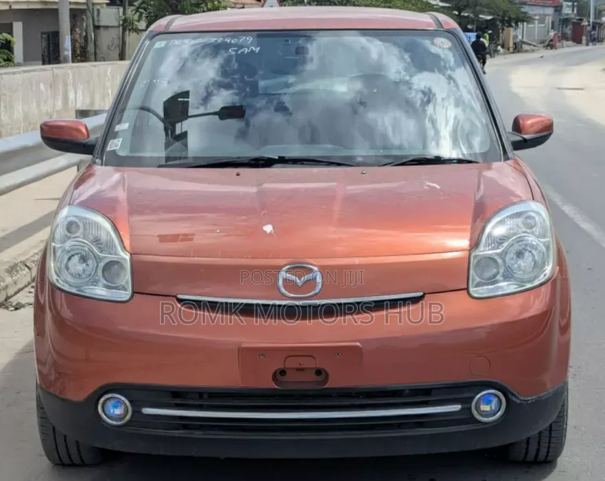 Mazda Verisa 2009 Red