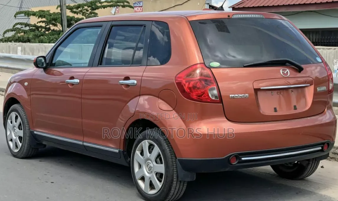 Mazda Verisa 2009 Red