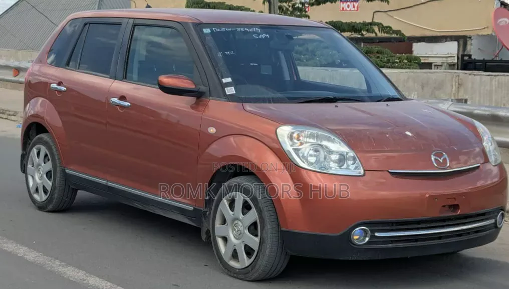 Mazda Verisa 2009 Red