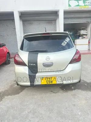 Nissan Tiida 2010 Gold