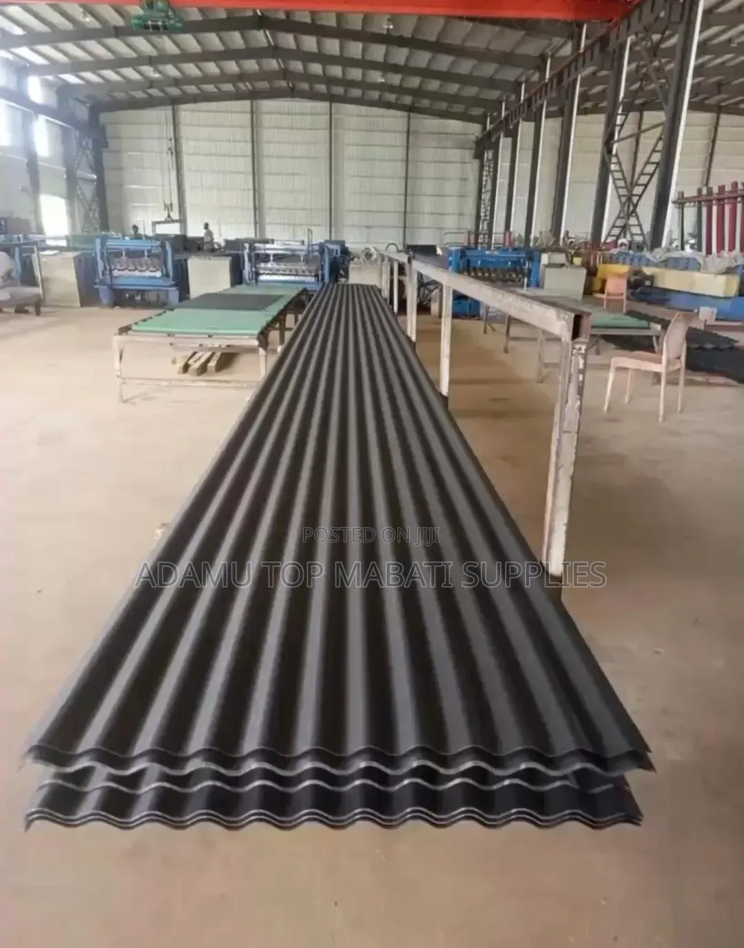 This Is a Rough Corrugated Sheet With a Charcoal Grey Color.