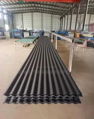 This Is a Rough Corrugated Sheet With a Charcoal Grey Color.