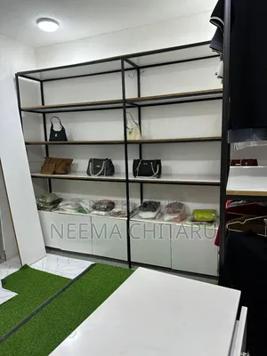 Shelf Za Kuwekea Nguo Dukani