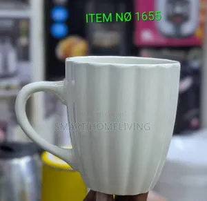 Vikombe/White Ceramic Mug Featuring a Fluted