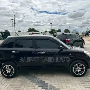 Mazda Verisa 2010 Brown