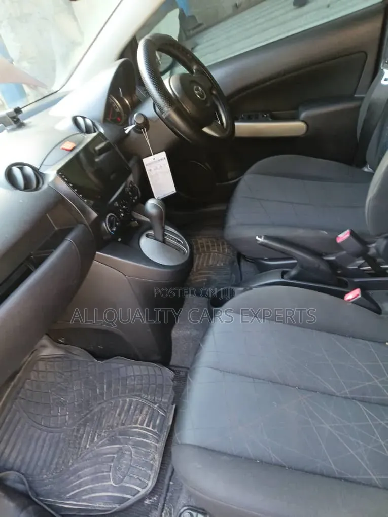 Mazda Demio 2012 Maroon