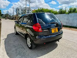 Mazda Verisa 2004 Maroon