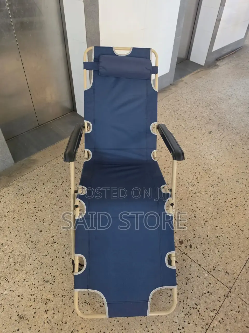 This Blue Portable Folding Beach Chair Features a Steel Frame And