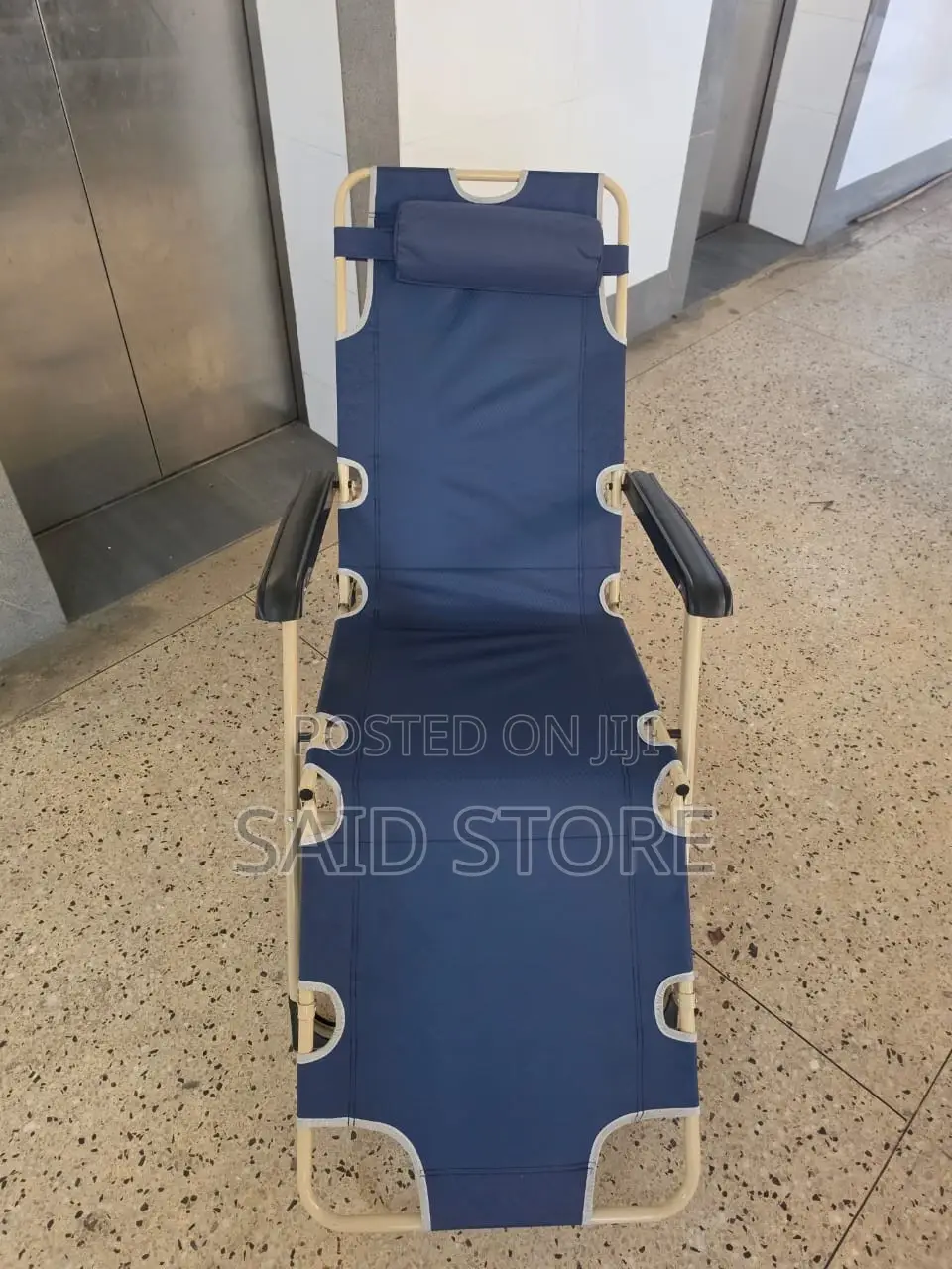 This Blue Portable Folding Beach Chair Features a Steel Frame And