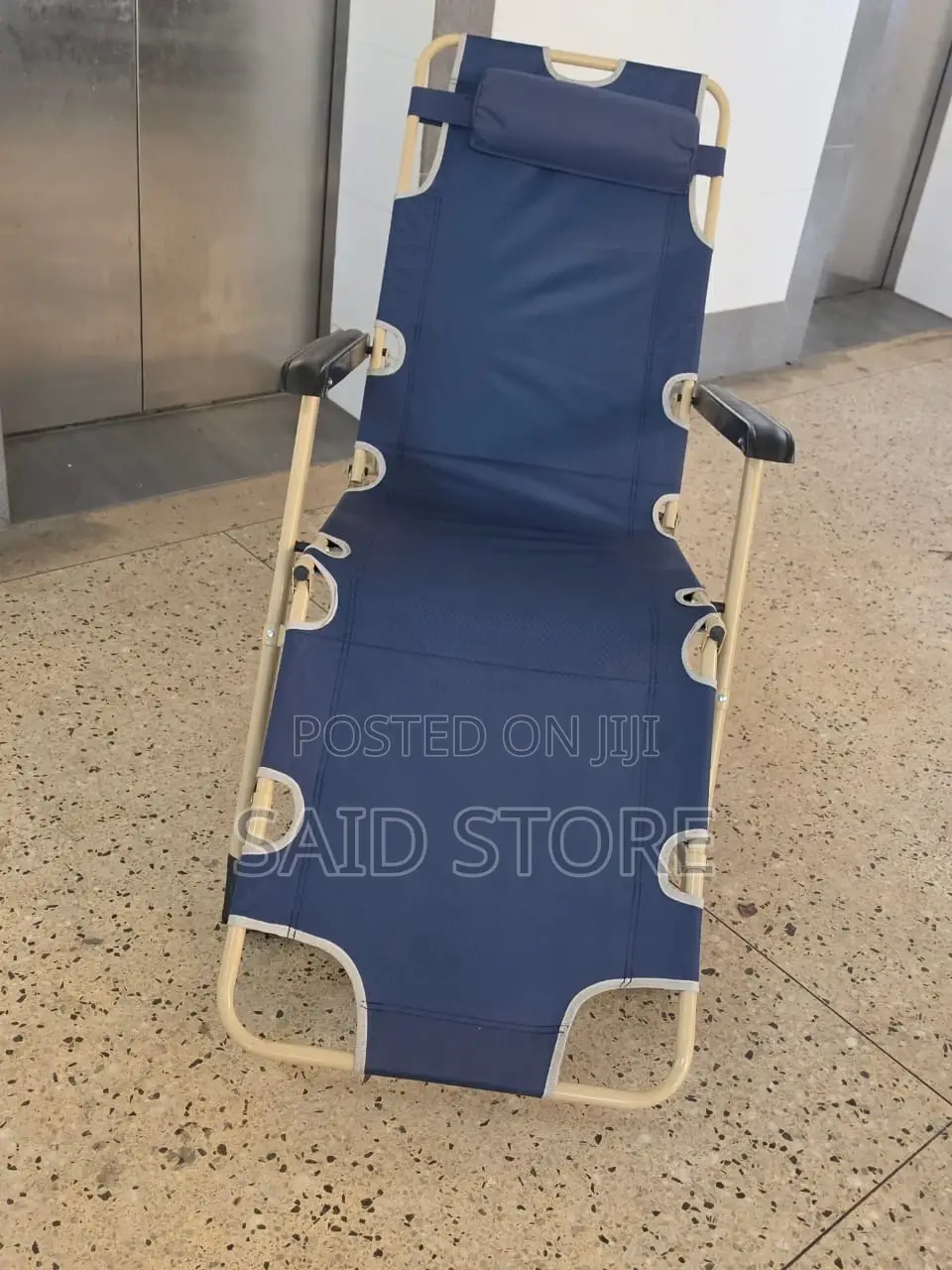 This Blue Portable Folding Beach Chair Features a Steel Frame And