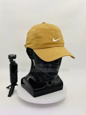 Nike Dri-Fit Caps Feature White Swoosh Logo