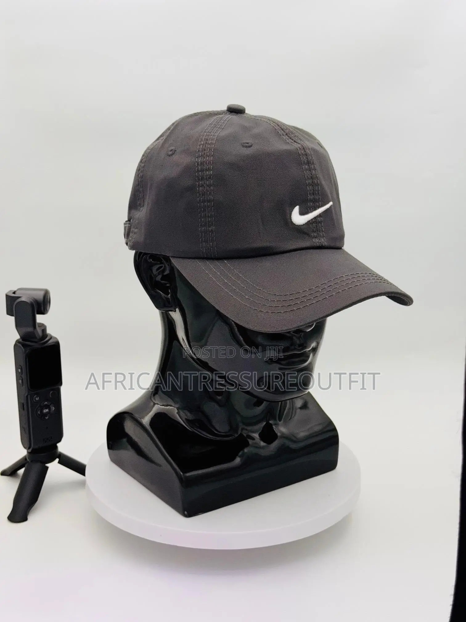 Nike Dri-Fit Caps Feature White Swoosh Logo
