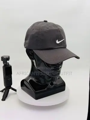 Nike Dri-Fit Caps Feature White Swoosh Logo