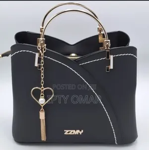 Chic Black Handbag With Stylish Heart Charm