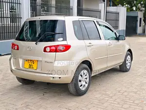 Mazda Demio 2009 Beige