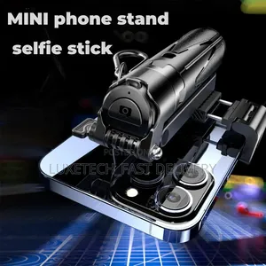 P15 Mini Selfie Stick Tripod With Bluetooth Remote (Pocket Size)