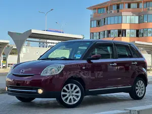 Mazda Verisa 2013 Maroon