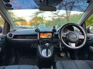 Mazda Demio 2012 Maroon