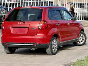 Mazda Verisa 2010 Red