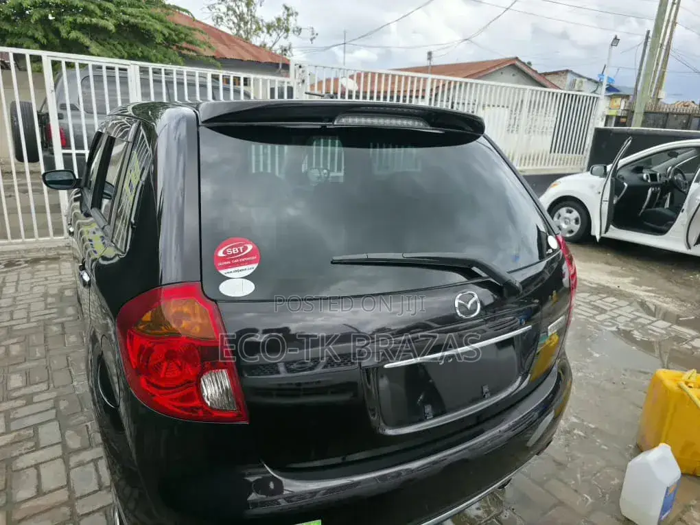 Mazda Verisa 2012 Maroon