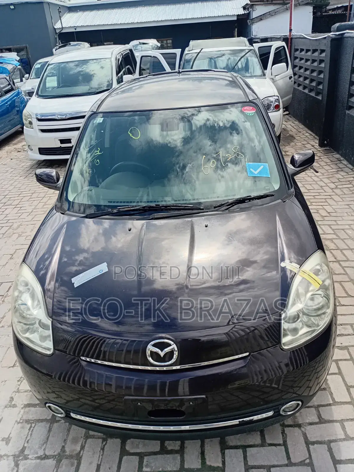 Mazda Verisa 2012 Maroon