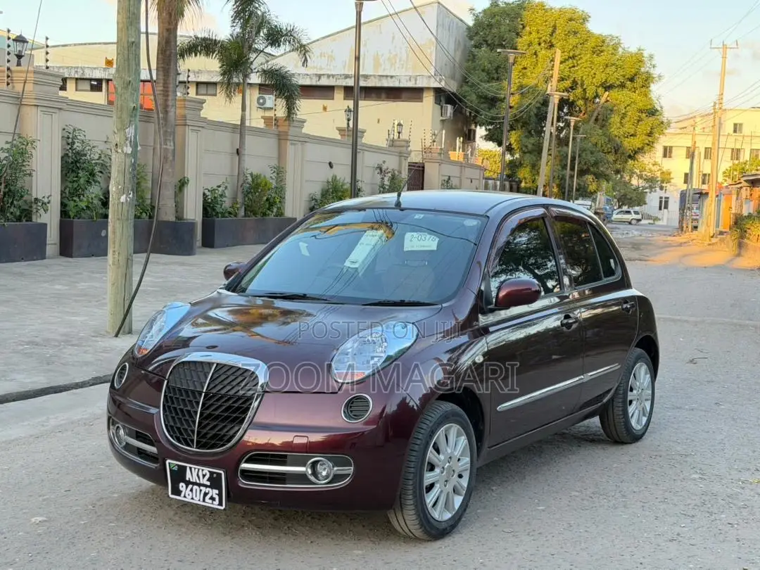 Nissan March 2006 Maroon