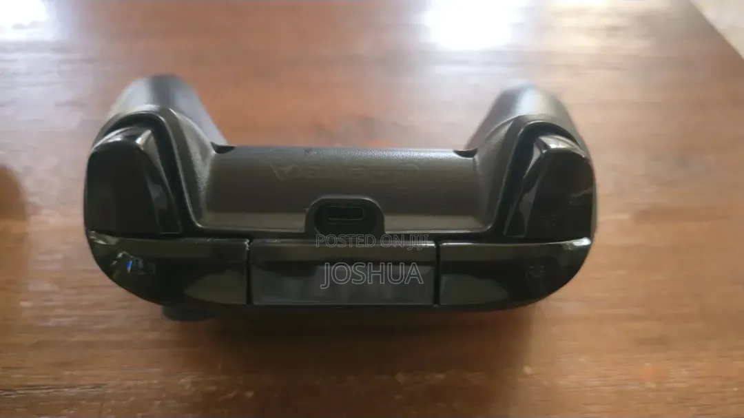 Black Xbox Power a Wired Controller