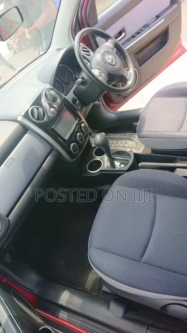 Mazda Verisa 2009 Red