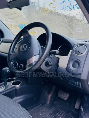 Mazda Verisa 2009 Pearl