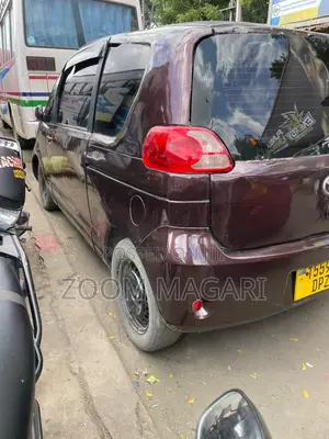 Toyota Porte 2005 Maroon