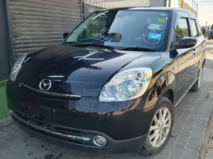 Mazda Verisa 2013 Maroon