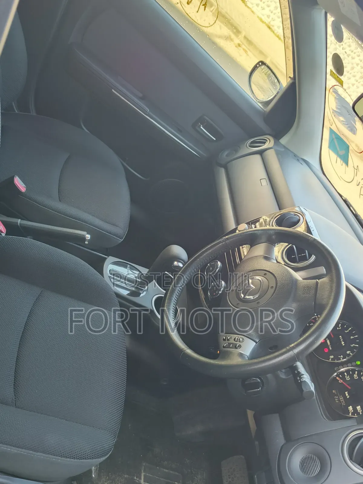 Mazda Verisa 2013 Maroon
