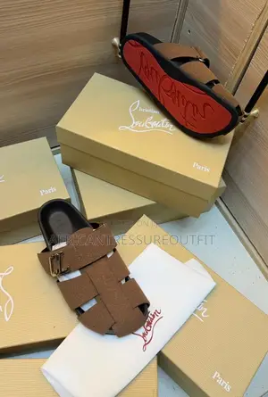 Christian Louboutin Sandal Are Beige Suede and Cl Branded Strap Detail