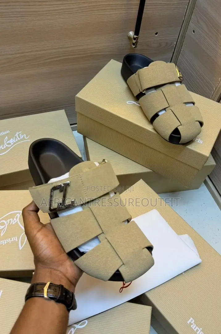 Christian Louboutin Sandal Are Beige Suede and Cl Branded Strap Detail