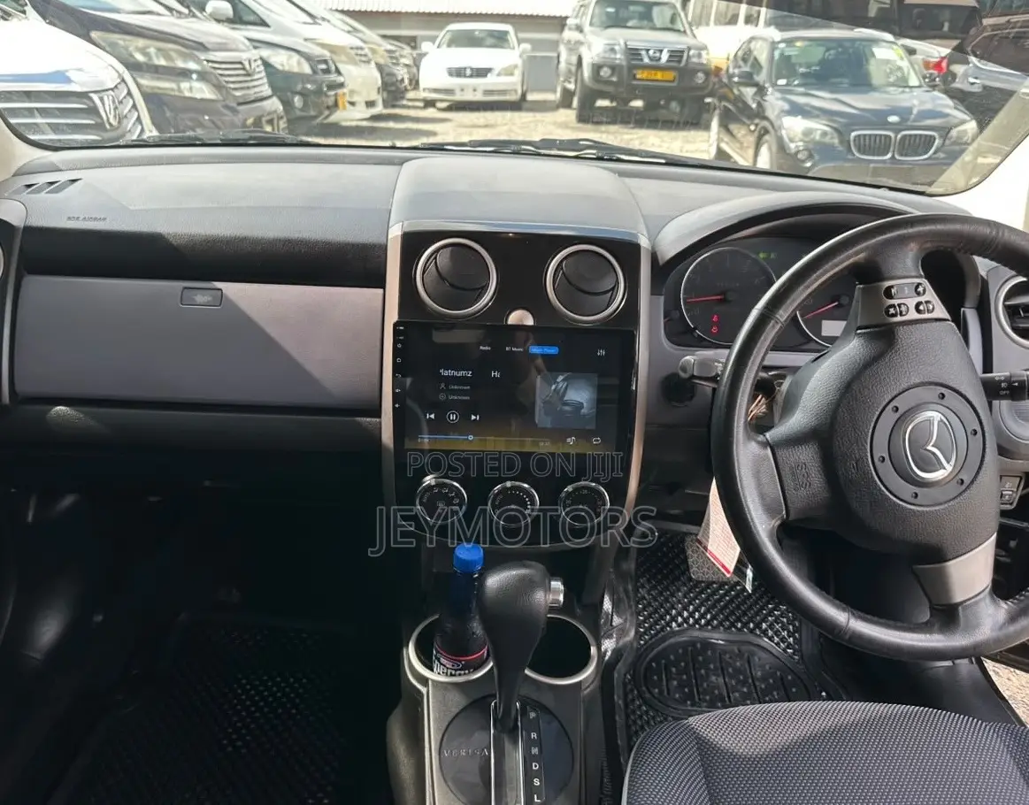 Mazda Verisa 2010 Maroon