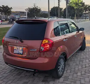 Mazda Verisa 2013 Maroon