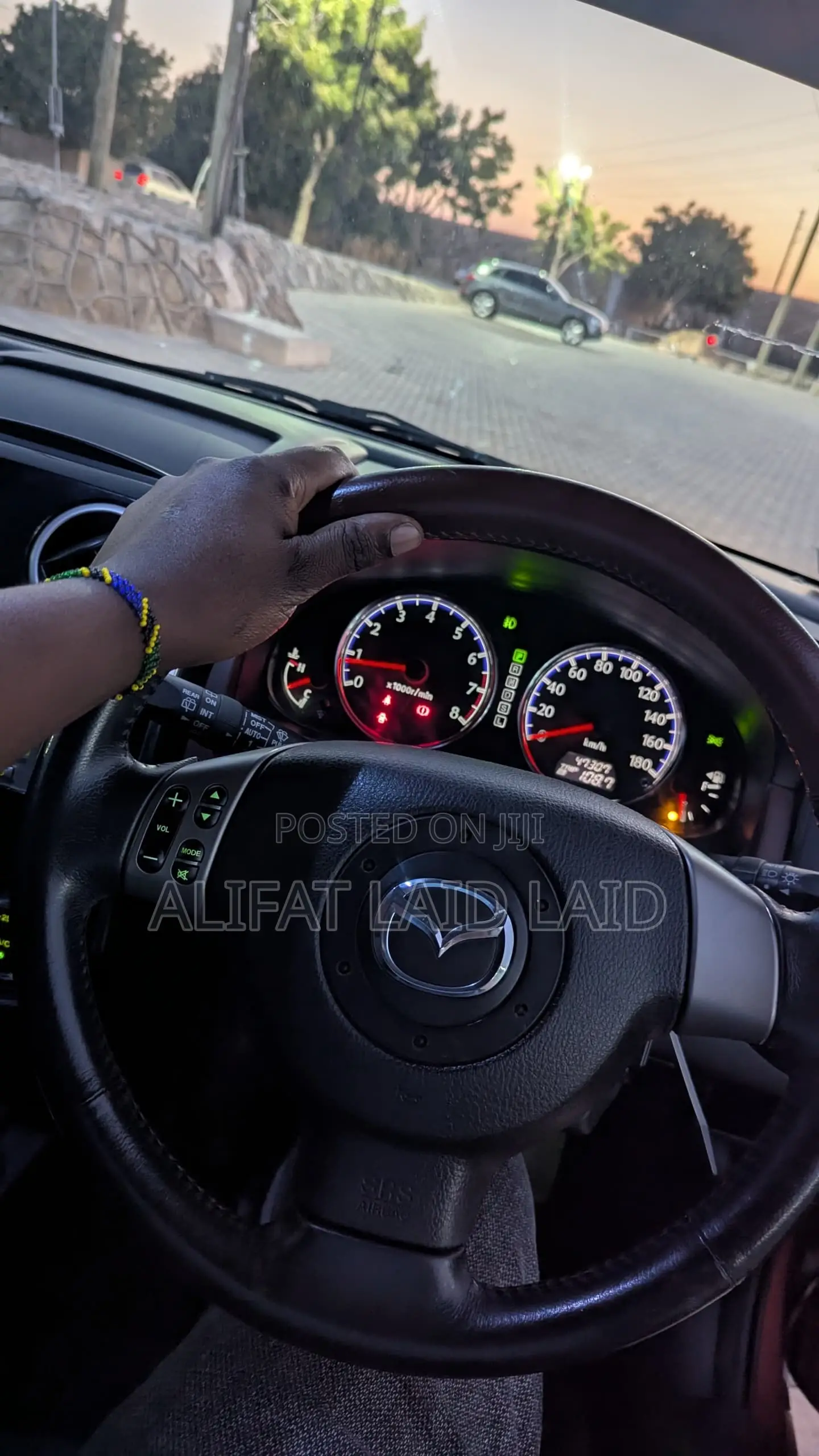 Mazda Verisa 2013 Maroon