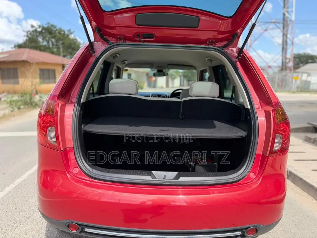 Mazda Verisa 2010 Maroon