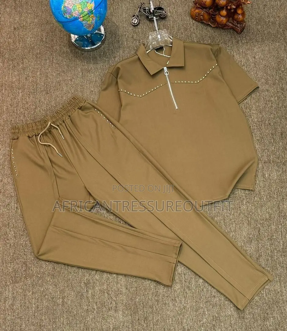 Cinvoph Two-Piece Set Features a Short Sleeve Shirt With a Zip Placket