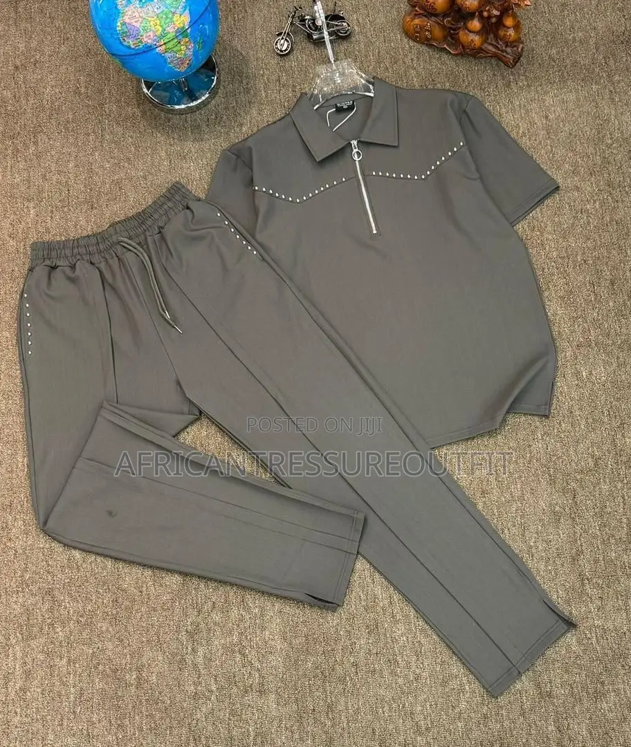Cinvoph Two-Piece Set Features a Short Sleeve Shirt With a Zip Placket