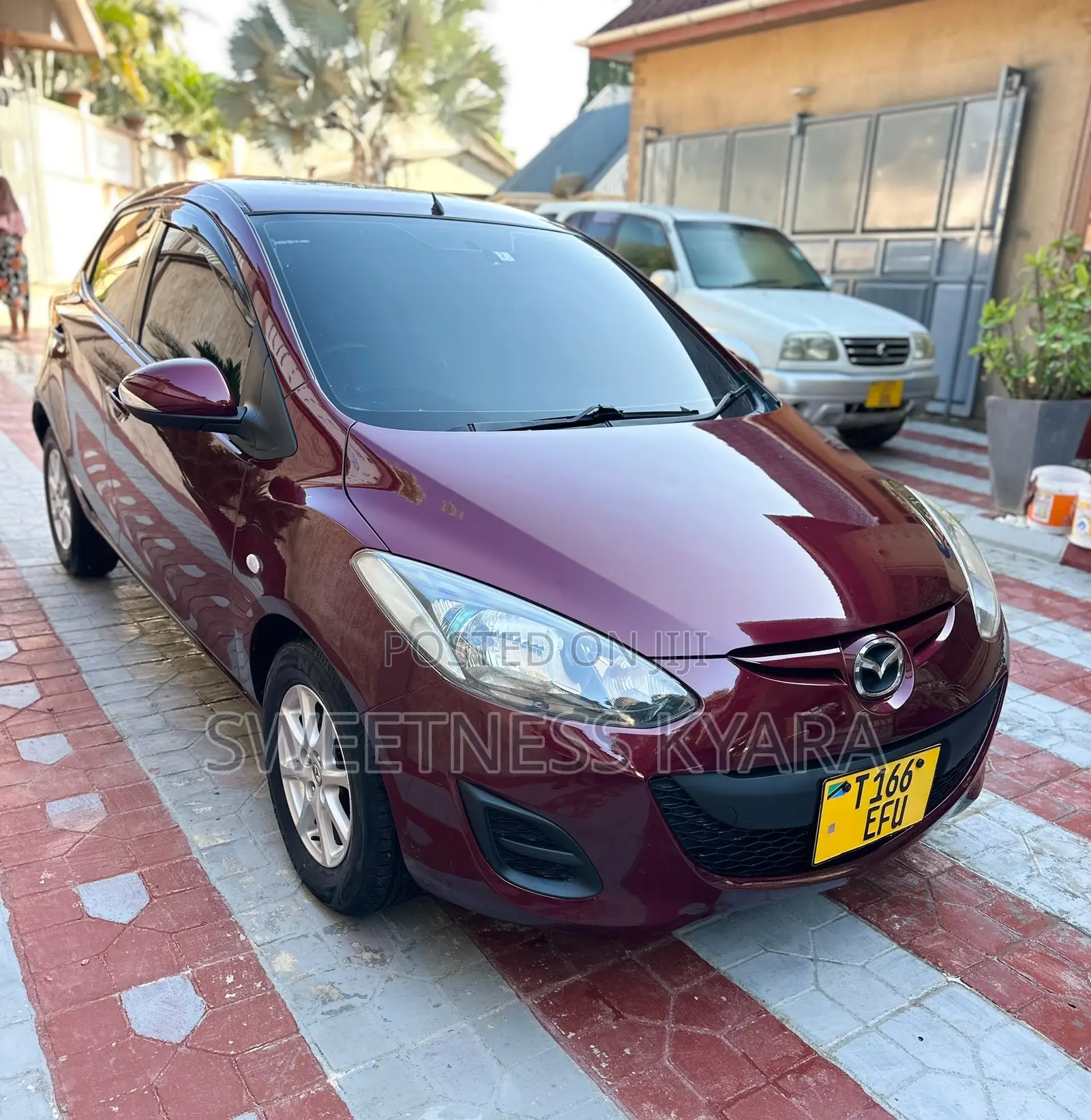 Mazda Demio 2012 Maroon