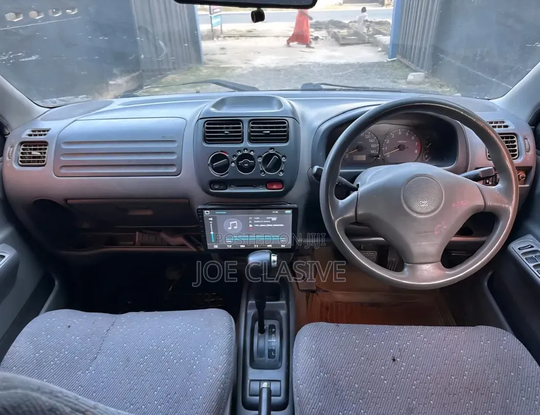 Suzuki Swift 2003 Maroon