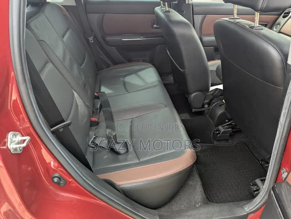 Mazda Verisa 2010 Red