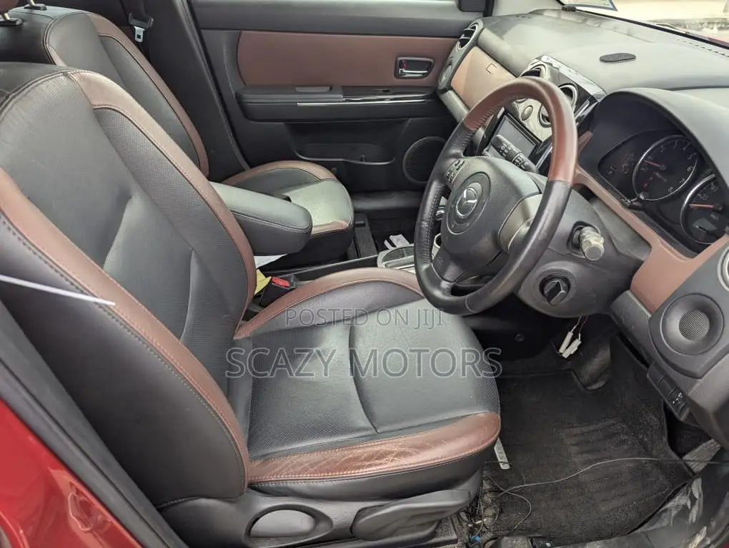 Mazda Verisa 2010 Red