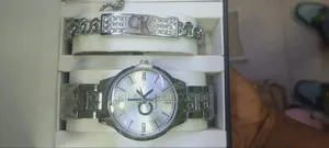 Calvin Klein 5 in 1-Watch,Bracelet, Necklace, Ring, Ear Ring