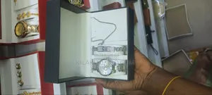 Calvin Klein 5 in 1-Watch,Bracelet, Necklace, Ring, Ear Ring