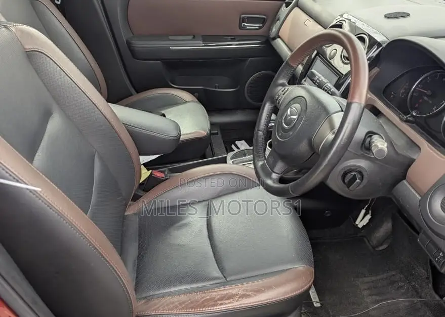 Mazda Verisa 2010 Red